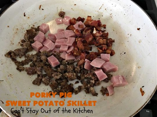 Porky Pig Sweet Potato Skillet | Can't Stay Out of the Kitchen | this amazing #BreakfastSkillet includes #SweetPotatoes, #bacon, #sausage, #ham, eggs and both #MontereyJack & #CheddarCheese. It makes for one really hearty #breakfast for weekends, company or #holidays. #brunch #pork #HolidayBreakfast #PorkyPigSweetPotatoSkillet #SkilletBreakfast