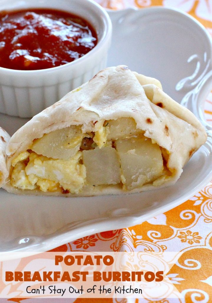 Potato Breakfast Burritos | Can't Stay Out of the Kitchen | these #BreakfastBurritos are heavenly! Warm #tortillas are filled with seasoned #FriedPotatoes, #eggs & #CheddarCheese. They are so mouthwatering, hearty, filling & totally satisfying for #breakfast or #MeatlessMondays. These can be made up ahead then microwaved when you're on the way out the door! #potatoes #burritos #TexMex #TexMexBreakfastBurritos #Holiday #PotatoBreakfastBurritos #HolidayBreakfast