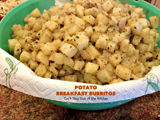 Potato Breakfast Burritos | Can't Stay Out of the Kitchen | these #BreakfastBurritos are heavenly! Warm #tortillas are filled with seasoned #FriedPotatoes, #eggs & #CheddarCheese. They are so mouthwatering, hearty, filling & totally satisfying for #breakfast or #MeatlessMondays. These can be made up ahead then microwaved when you're on the way out the door! #potatoes #burritos #TexMex #TexMexBreakfastBurritos #Holiday #PotatoBreakfastBurritos #HolidayBreakfast