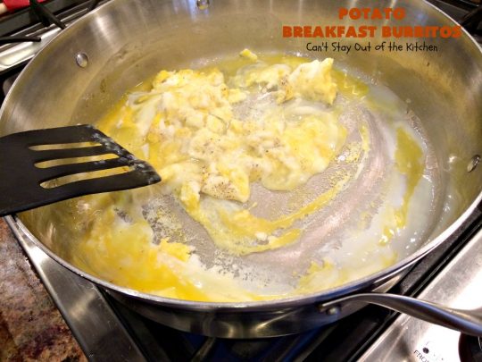 Potato Breakfast Burritos | Can't Stay Out of the Kitchen | these #BreakfastBurritos are heavenly! Warm #tortillas are filled with seasoned #FriedPotatoes, #eggs & #CheddarCheese. They are so mouthwatering, hearty, filling & totally satisfying for #breakfast or #MeatlessMondays. These can be made up ahead then microwaved when you're on the way out the door! #potatoes #burritos #TexMex #TexMexBreakfastBurritos #Holiday #PotatoBreakfastBurritos #HolidayBreakfast