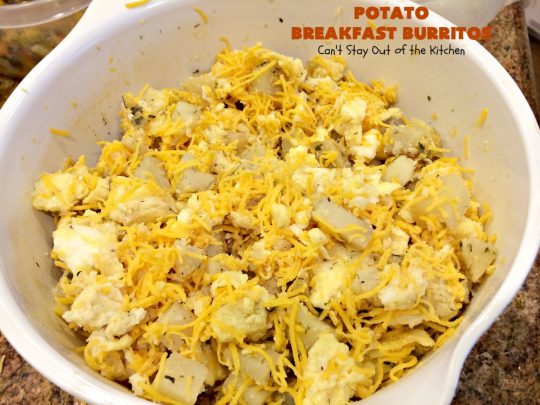 Potato Breakfast Burritos | Can't Stay Out of the Kitchen | these #BreakfastBurritos are heavenly! Warm #tortillas are filled with seasoned #FriedPotatoes, #eggs & #CheddarCheese. They are so mouthwatering, hearty, filling & totally satisfying for #breakfast or #MeatlessMondays. These can be made up ahead then microwaved when you're on the way out the door! #potatoes #burritos #TexMex #TexMexBreakfastBurritos #Holiday #PotatoBreakfastBurritos #HolidayBreakfast