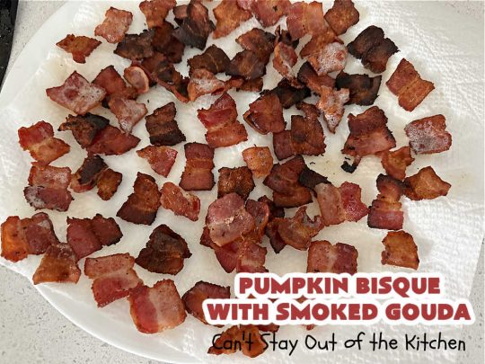 Pumpkin Bisque with Smoked Gouda | Can't Stay Out of the Kitchen | this easy 30 minute #recipe includes the savory flavors of #bacon, #GoudaCheese & #garlic & the spicy flavors of #nutmeg & #PumpkinPieSpice. This easy #soup is marvelous for weeknight suppers when you're short on time. If you have leftovers, it reheats well for lunches too. #PumpkinSoup #GlutenFree #pork #PumpkinSeeds #PumpkinBisqueWithSmokedGouda #30MinuteRecipe