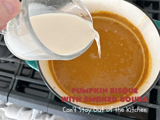 Pumpkin Bisque with Smoked Gouda | Can't Stay Out of the Kitchen | this easy 30 minute #recipe includes the savory flavors of #bacon, #GoudaCheese & #garlic & the spicy flavors of #nutmeg & #PumpkinPieSpice. This easy #soup is marvelous for weeknight suppers when you're short on time. If you have leftovers, it reheats well for lunches too. #PumpkinSoup #GlutenFree #pork #PumpkinSeeds #PumpkinBisqueWithSmokedGouda #30MinuteRecipe