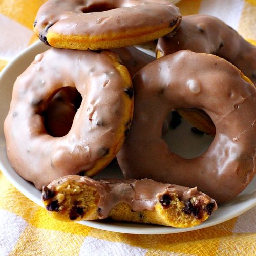 Pumpkin Chocolate Chip Donuts | Can't Stay Out of the Kitchen | these phenomenal #donuts are so mouthwatering. They have double the #chocolate & double the #pumpkin flavor. You'll be drooling over every mouthful. Highly recommended for #MothersDay or #FathersDay #Breakfast. #Holiday #HolidayBreakfast #PumpkinDonuts #ChocolateChipDonuts #fall #FallBaking #PumpkinChocolateChipDonuts #ChocolateChips