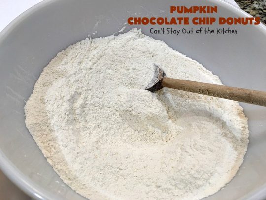 Pumpkin Chocolate Chip Donuts | Can't Stay Out of the Kitchen | these phenomenal #donuts are so mouthwatering. They have double the #chocolate & double the #pumpkin flavor. You'll be drooling over every mouthful. Highly recommended for #MothersDay or #FathersDay #Breakfast. #Holiday #HolidayBreakfast #PumpkinDonuts #ChocolateChipDonuts #fall #FallBaking #PumpkinChocolateChipDonuts #ChocolateChips