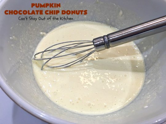 Pumpkin Chocolate Chip Donuts | Can't Stay Out of the Kitchen | these phenomenal #donuts are so mouthwatering. They have double the #chocolate & double the #pumpkin flavor. You'll be drooling over every mouthful. Highly recommended for #MothersDay or #FathersDay #Breakfast. #Holiday #HolidayBreakfast #PumpkinDonuts #ChocolateChipDonuts #fall #FallBaking #PumpkinChocolateChipDonuts #ChocolateChips