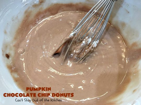 Pumpkin Chocolate Chip Donuts | Can't Stay Out of the Kitchen | these phenomenal #donuts are so mouthwatering. They have double the #chocolate & double the #pumpkin flavor. You'll be drooling over every mouthful. Highly recommended for #MothersDay or #FathersDay #Breakfast. #Holiday #HolidayBreakfast #PumpkinDonuts #ChocolateChipDonuts #fall #FallBaking #PumpkinChocolateChipDonuts #ChocolateChips