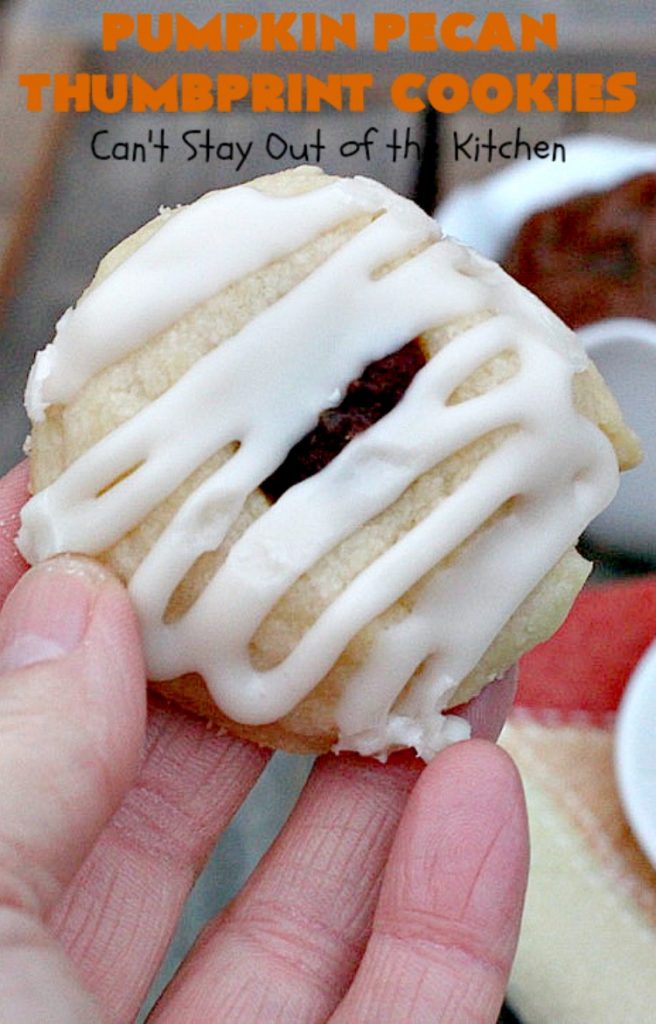 Pumpkin Pecan Thumbprint Cookies | Can't Stay Out of the Kitchen | these delectable #cookies use a #pumpkin #pecan butter then they're glazed with a vanilla icing. They're wonderful for #holiday or #Christmas parties or #ChristmasCookieExchanges. #ChristmasCookie #WilliamsSonoma #PecanPumpkinButter #MuirheadPecanPumpkinButter #cookies #ThumbprintCookies #dessert #Fall #FallBaking #HolidayDessert #ChristmasDessert