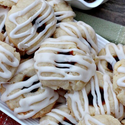 Pumpkin Pecan Thumbprint Cookies | Can't Stay Out of the Kitchen | these delectable #cookies use a #pumpkin #pecan butter then they're glazed with a vanilla icing. They're wonderful for #holiday or #Christmas parties or #ChristmasCookieExchanges. #ChristmasCookie #WilliamsSonoma #PecanPumpkinButter #MuirheadPecanPumpkinButter #cookies #ThumbprintCookies #dessert #Fall #FallBaking #HolidayDessert #ChristmasDessert