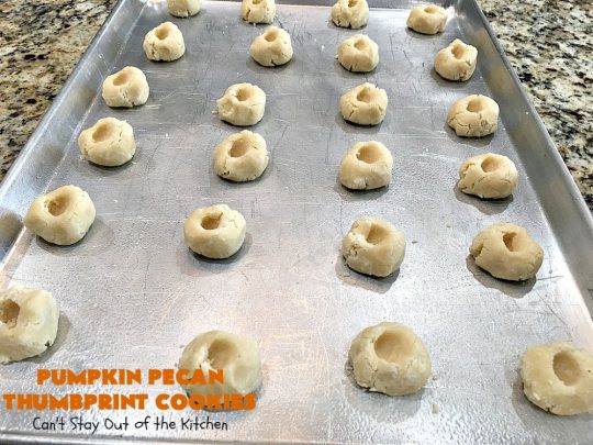 Pumpkin Pecan Thumbprint Cookies | Can't Stay Out of the Kitchen | these delectable #cookies use a #pumpkin #pecan butter then they're glazed with a vanilla icing. They're wonderful for #holiday or #Christmas parties or #ChristmasCookieExchanges. #ChristmasCookie #WilliamsSonoma #PecanPumpkinButter #MuirheadPecanPumpkinButter #cookies #ThumbprintCookies #dessert #Fall #FallBaking #HolidayDessert #ChristmasDessert