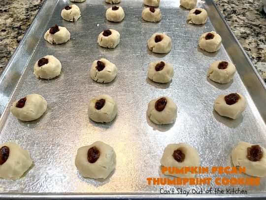 Pumpkin Pecan Thumbprint Cookies | Can't Stay Out of the Kitchen | these delectable #cookies use a #pumpkin #pecan butter then they're glazed with a vanilla icing. They're wonderful for #holiday or #Christmas parties or #ChristmasCookieExchanges. #ChristmasCookie #WilliamsSonoma #PecanPumpkinButter #MuirheadPecanPumpkinButter #cookies #ThumbprintCookies #dessert #Fall #FallBaking #HolidayDessert #ChristmasDessert
