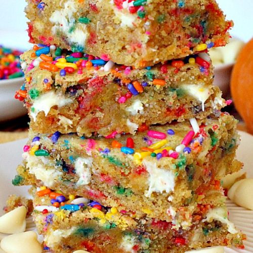 Pumpkin Sprinkle Blondies | Can't Stay Out of the Kitchen | These amazing blondies are so easy because they're made with a #pumpkin cake mix! Sprinkles & #whitechocolatechips make them fantastic. #dessert #chocolate #cookie