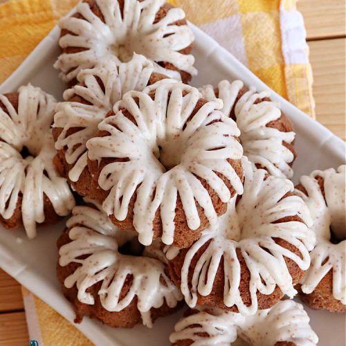 Pumpkin Toffee Tea Cakes | Can't Stay Out of the Kitchen | these spectacular #TeaCakes will wow all your family & friends. They're flavored with #pumpkin & spices & include #HeathEnglishToffeeBits. Then they're iced with #CinnamonToastCrunch icing! Amazing #holiday or #Christmas #dessert #cake #HolidayDessert #PumpkinDessert #PumpkinToffeeTeaCakes