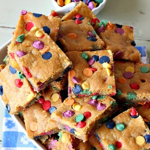 Rainbow Chip Blondies | Can't Stay Out of the Kitchen | these outrageous #brownies will knock your socks off. They're made with #RainbowChips so they're packed with color and flavor. Terrific for #tailgating parties, potlucks & backyard BBQs. #ChristmasCookieExchange #dessert #cookie #holiday #HolidayDessert #BirthdayDessert #RainbowChipBlondies