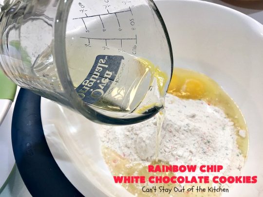 Rainbow Chip White Chocolate Cookies | Can't Stay Out of the Kitchen | these luscious 4-ingredient #cookies start with a #RainbowChipCakeMix so they're incredibly easy. #WhiteChocolateChips bump up the flavor and texture. They're perfect for birthday parties or any kind of kid-friendly function. You and your kids will enjoy every bite! #dessert #chocolate #Funfetti #RainbowChips #RainbowSprinkles #RainbowSprinkleDessert #ChocolateDessert #tailgating #holiday #BirthdayParties #HolidayBaking