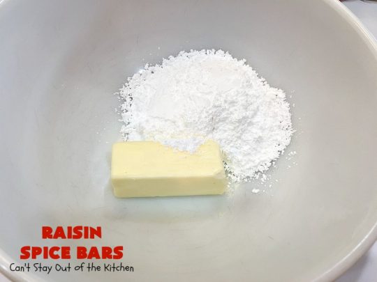 Raisin Spice Bars | Can't Stay Out of the Kitchen | these luscious #cookies are filled with #raisins & #pecans. Terrific #dessert any time of the year. They have a rich, #lemon buttercream icing. #brownie #RaisinSpiceBars #Tailgating #Holiday #HolidayDessert #ChristmasCookieExchange #SpiceCookies #RaisinCookies