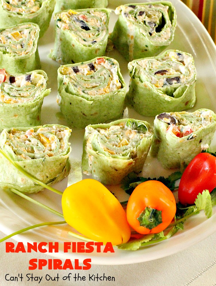 Ranch Fiesta Spirals | Can't Stay Out of the Kitchen | these fantastic #TexMex #appetizers are perfect for #tailgating, #NewYearsEve or #SuperBowl parties. They're filled with green #chilies, #olives, #cheese & bell peppers in a delicious #Ranch dressing cream cheese mix.
