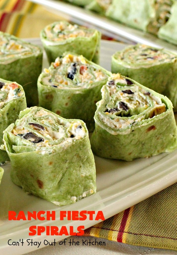 Ranch Fiesta Spirals | Can't Stay Out of the Kitchen | these fantastic #TexMex #appetizers are perfect for #tailgating, #NewYearsEve or #SuperBowl parties. They're filled with green #chilies, #olives, #cheese & bell peppers in a delicious #Ranch dressing cream cheese mix.