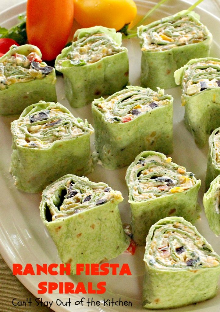 Ranch Fiesta Spirals | Can't Stay Out of the Kitchen | these fantastic #TexMex #appetizers are perfect for #tailgating, #NewYearsEve or #SuperBowl parties. They're filled with green #chilies, #olives, #cheese & bell peppers in a delicious #Ranch dressing cream cheese mix.