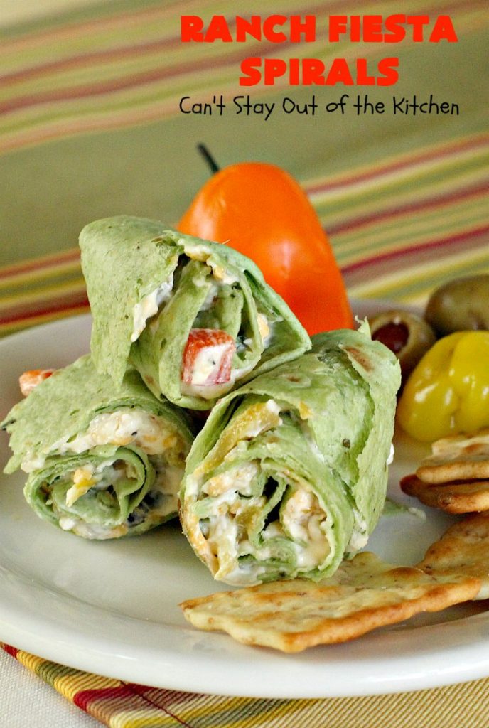 Ranch Fiesta Spirals | Can't Stay Out of the Kitchen | these fantastic #TexMex #appetizers are perfect for #tailgating, #NewYearsEve or #SuperBowl parties. They're filled with green #chilies, #olives, #cheese & bell peppers in a delicious #Ranch dressing cream cheese mix.