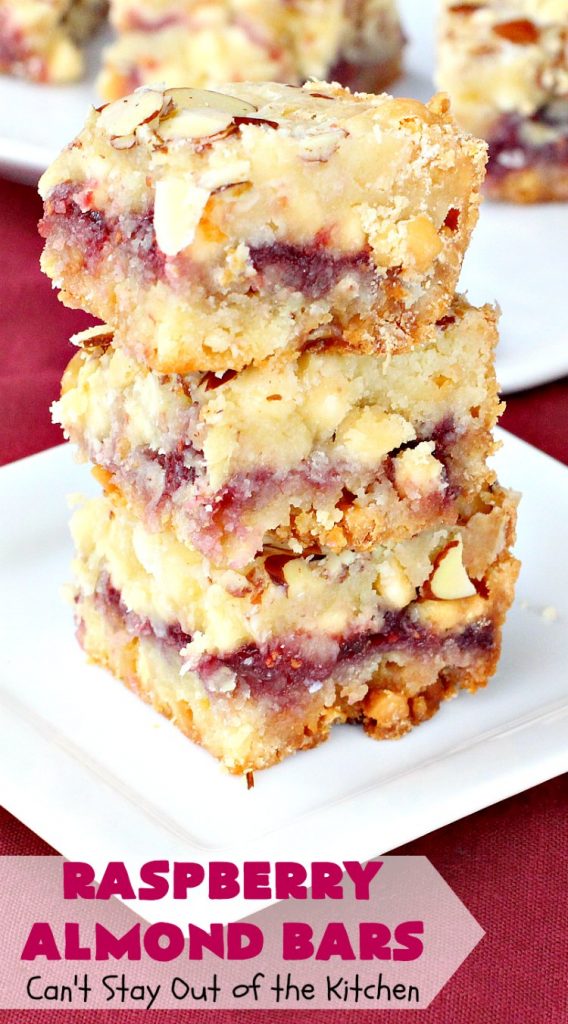 Raspberry Almond Bars | Can't Stay Out of the Kitchen | these irresistible #brownies are rich, decadent & absolutely sensational! They're perfect for #holiday & #Christmas #baking as they are so festive & beautiful. These layered #cookies use vanilla chips, #Raspberry preserves & #almonds. #holidaybaking #ChristmasCookieExchange #dessert #raspberrydessert