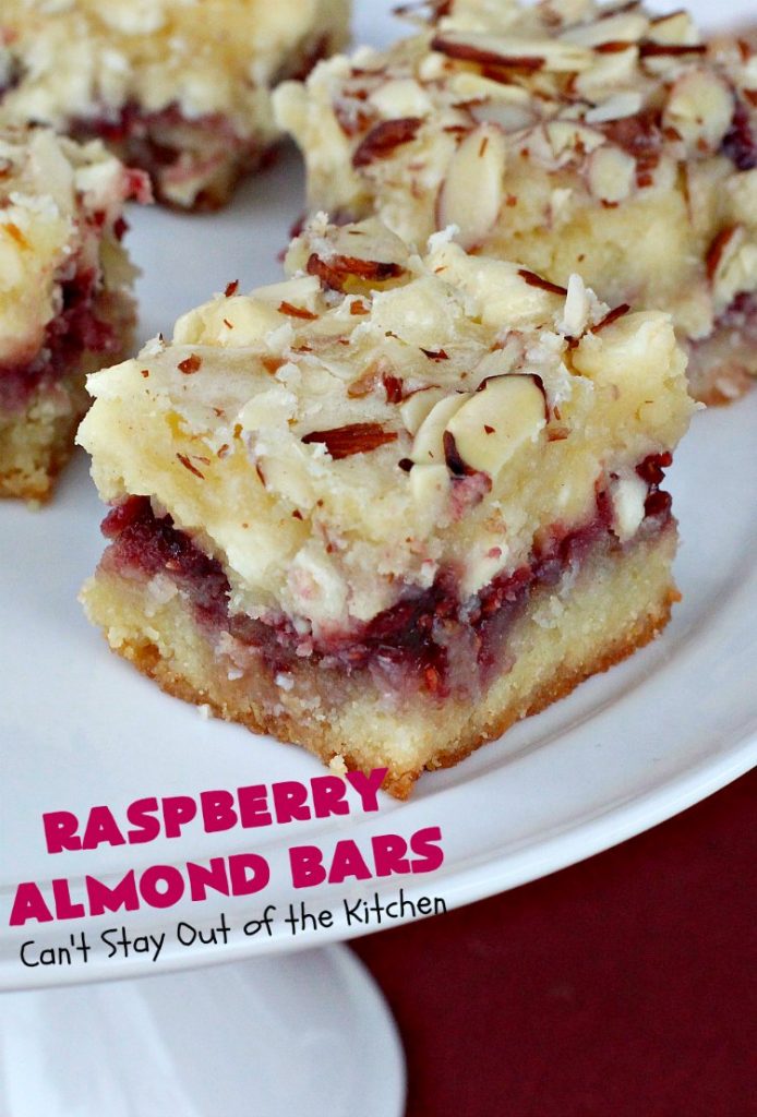 Raspberry Almond Bars | Can't Stay Out of the Kitchen | these irresistible #brownies are rich, decadent & absolutely sensational! They're perfect for #holiday & #Christmas #baking as they are so festive & beautiful. These layered #cookies use vanilla chips, #Raspberry preserves & #almonds. #holidaybaking #ChristmasCookieExchange #dessert #raspberrydessert