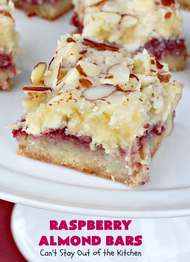 Raspberry Almond Bars | Can't Stay Out of the Kitchen | these irresistible #brownies are rich, decadent & absolutely sensational! They're perfect for #holiday & #Christmas #baking as they are so festive & beautiful. These layered #cookies use vanilla chips, #Raspberry preserves & #almonds. #holidaybaking #ChristmasCookieExchange #dessert #raspberrydessert