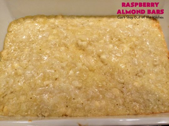 Raspberry Almond Bars | Can't Stay Out of the Kitchen | these irresistible #brownies are rich, decadent & absolutely sensational! They're perfect for #holiday & #Christmas #baking as they are so festive & beautiful. These layered #cookies use vanilla chips, #Raspberry preserves & #almonds. #holidaybaking #ChristmasCookieExchange #dessert #raspberrydessert