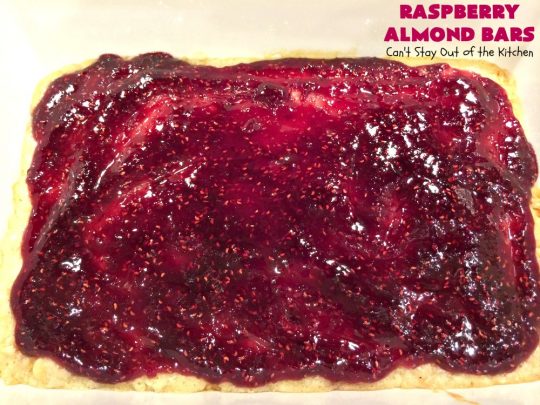 Raspberry Almond Bars | Can't Stay Out of the Kitchen | these irresistible #brownies are rich, decadent & absolutely sensational! They're perfect for #holiday & #Christmas #baking as they are so festive & beautiful. These layered #cookies use vanilla chips, #Raspberry preserves & #almonds. #holidaybaking #ChristmasCookieExchange #dessert #raspberrydessert