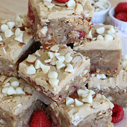 Raspberry Almond Blondies | Can't Stay Out of the Kitchen | indulge yourself with these festive, beautiful & elegant #cookies for the #holidays this year. They're incredibly rich, decadent & swoon-worthy! They're chocked full of #raspberries, #almonds & #VanillaChips. Every bite will rock your world! #brownies #dessert #RaspberryDessert #HolidayDessert #Christmas #Thanksgiving #ChristmasCookieExchange