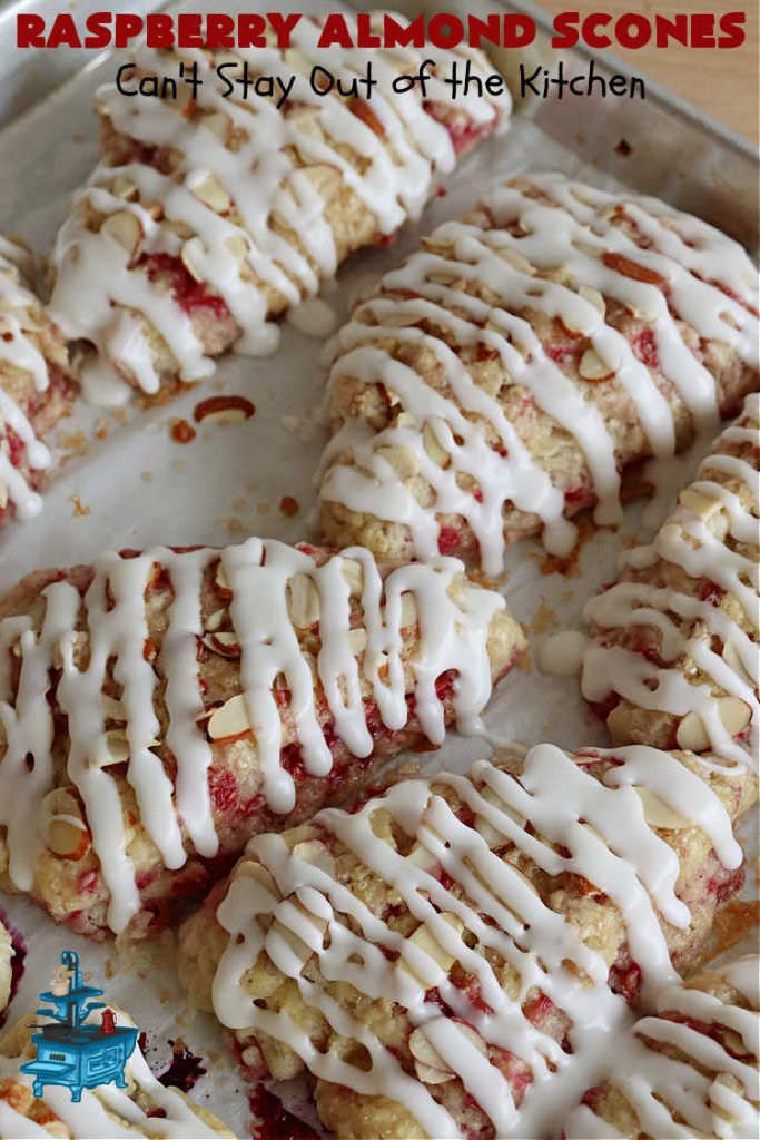 Raspberry Almond Scones | Can't Stay Out of the Kitchen | these delicious #scones are a perfect idea for a company or #holiday #breakfast, like #Thanksgiving or #Christmas. They're filled with fresh #raspberries, sliced #almonds & include #AlmondExtract in the batter as well as the icing. Every bite will rock your world! If you enjoy a sweet treat with your morning coffee, you'll love these! #RaspberryAlmondScones