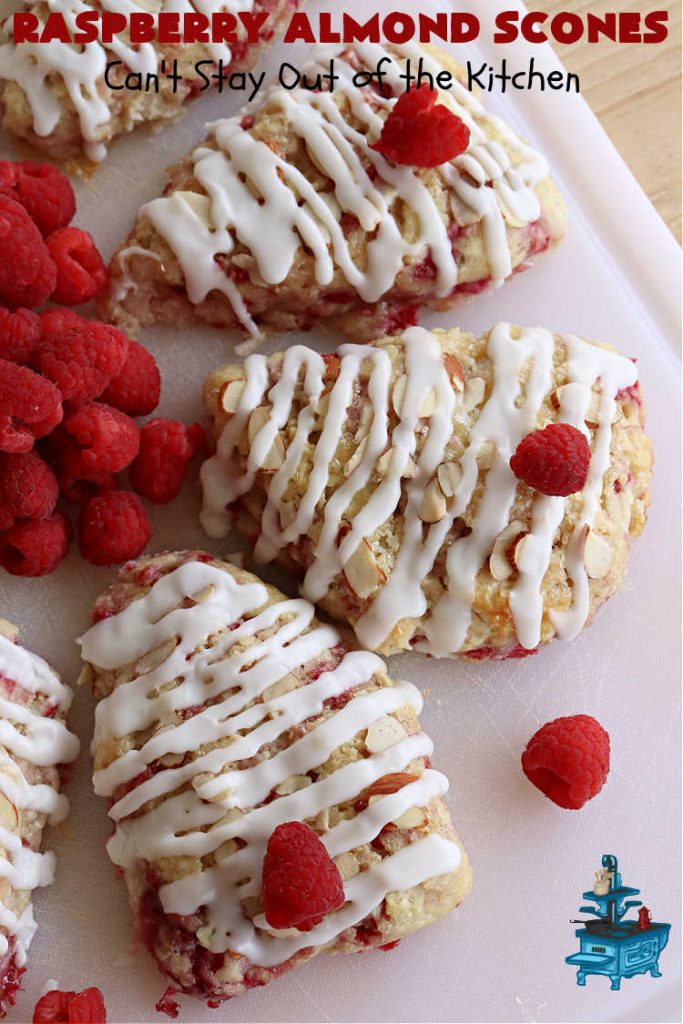Raspberry Almond Scones | Can't Stay Out of the Kitchen | these delicious #scones are a perfect idea for a company or #holiday #breakfast, like #Thanksgiving or #Christmas. They're filled with fresh #raspberries, sliced #almonds & include #AlmondExtract in the batter as well as the icing. Every bite will rock your world! If you enjoy a sweet treat with your morning coffee, you'll love these! #RaspberryAlmondScones