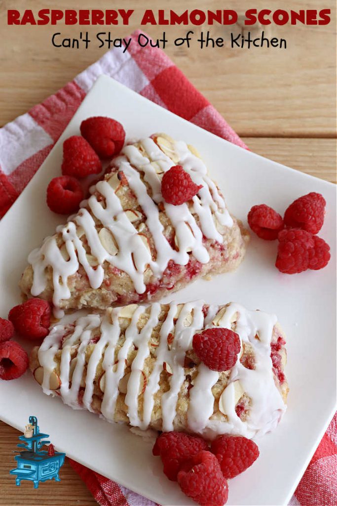 Raspberry Almond Scones | Can't Stay Out of the Kitchen | these delicious #scones are a perfect idea for a company or #holiday #breakfast, like #Thanksgiving or #Christmas. They're filled with fresh #raspberries, sliced #almonds & include #AlmondExtract in the batter as well as the icing. Every bite will rock your world! If you enjoy a sweet treat with your morning coffee, you'll love these! #RaspberryAlmondScones