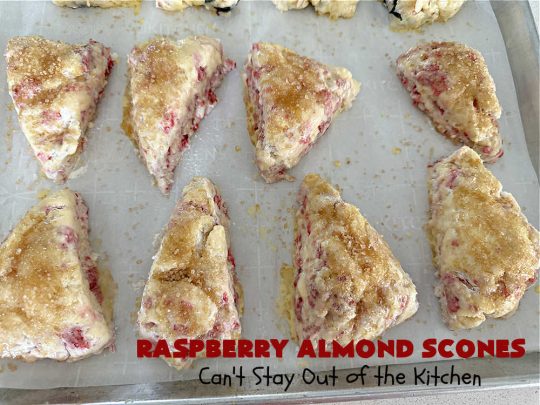 Raspberry Almond Scones | Can't Stay Out of the Kitchen | these delicious #scones are a perfect idea for a company or #holiday #breakfast, like #Thanksgiving or #Christmas. They're filled with fresh #raspberries, sliced #almonds & include #AlmondExtract in the batter as well as the icing. Every bite will rock your world! If you enjoy a sweet treat with your morning coffee, you'll love these! #RaspberryAlmondScones