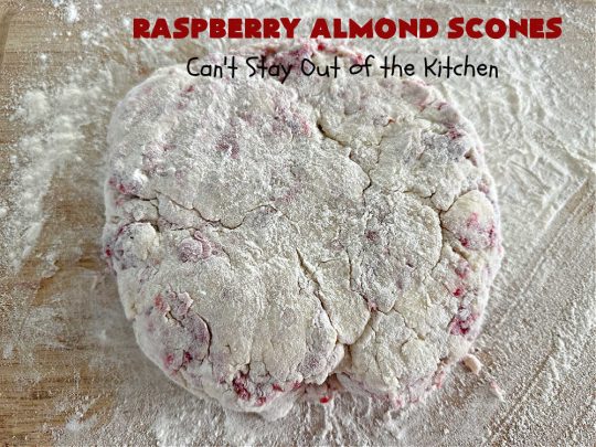 Raspberry Almond Scones | Can't Stay Out of the Kitchen | these delicious #scones are a perfect idea for a company or #holiday #breakfast, like #Thanksgiving or #Christmas. They're filled with fresh #raspberries, sliced #almonds & include #AlmondExtract in the batter as well as the icing. Every bite will rock your world! If you enjoy a sweet treat with your morning coffee, you'll love these! #RaspberryAlmondScones