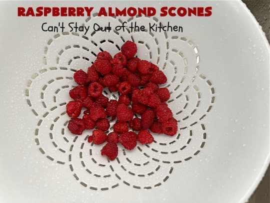 Raspberry Almond Scones | Can't Stay Out of the Kitchen | these delicious #scones are a perfect idea for a company or #holiday #breakfast, like #Thanksgiving or #Christmas. They're filled with fresh #raspberries, sliced #almonds & include #AlmondExtract in the batter as well as the icing. Every bite will rock your world! If you enjoy a sweet treat with your morning coffee, you'll love these! #RaspberryAlmondScones