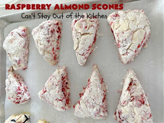 Raspberry Almond Scones | Can't Stay Out of the Kitchen | these delicious #scones are a perfect idea for a company or #holiday #breakfast, like #Thanksgiving or #Christmas. They're filled with fresh #raspberries, sliced #almonds & include #AlmondExtract in the batter as well as the icing. Every bite will rock your world! If you enjoy a sweet treat with your morning coffee, you'll love these! #RaspberryAlmondScones
