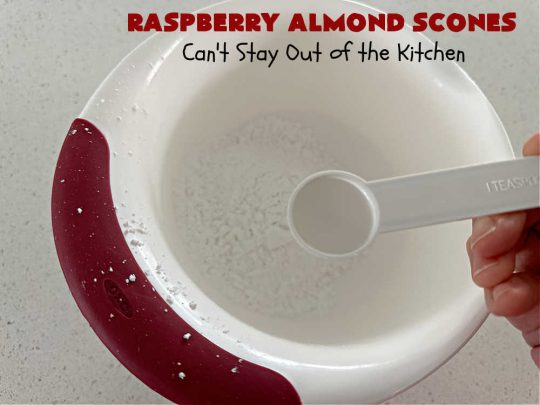 Raspberry Almond Scones | Can't Stay Out of the Kitchen | these delicious #scones are a perfect idea for a company or #holiday #breakfast, like #Thanksgiving or #Christmas. They're filled with fresh #raspberries, sliced #almonds & include #AlmondExtract in the batter as well as the icing. Every bite will rock your world! If you enjoy a sweet treat with your morning coffee, you'll love these! #RaspberryAlmondScones