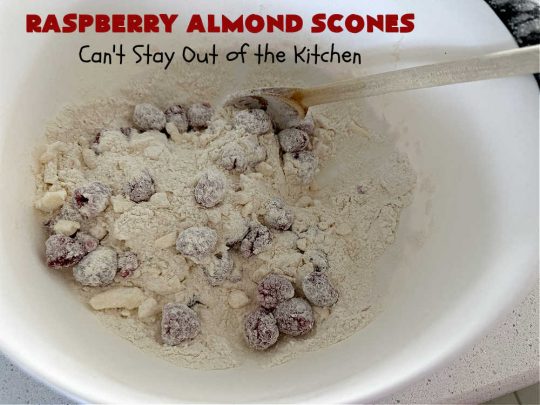 Raspberry Almond Scones | Can't Stay Out of the Kitchen | these delicious #scones are a perfect idea for a company or #holiday #breakfast, like #Thanksgiving or #Christmas. They're filled with fresh #raspberries, sliced #almonds & include #AlmondExtract in the batter as well as the icing. Every bite will rock your world! If you enjoy a sweet treat with your morning coffee, you'll love these! #RaspberryAlmondScones
