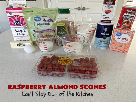 Raspberry Almond Scones | Can't Stay Out of the Kitchen | these delicious #scones are a perfect idea for a company or #holiday #breakfast, like #Thanksgiving or #Christmas. They're filled with fresh #raspberries, sliced #almonds & include #AlmondExtract in the batter as well as the icing. Every bite will rock your world! If you enjoy a sweet treat with your morning coffee, you'll love these! #RaspberryAlmondScones