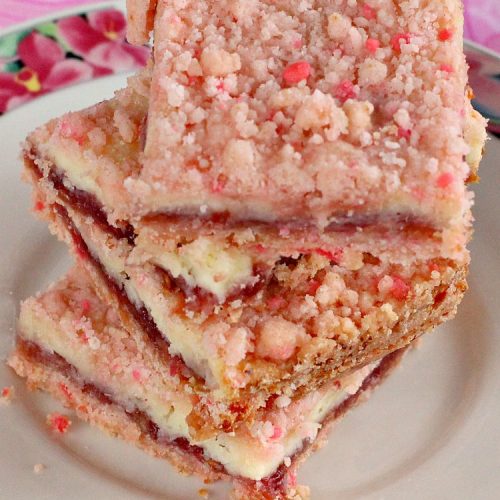 Raspberry Lemonade Bars | Can't Stay Out of the Kitchen | this heavenly 6-ingredient #recipe is perfect for #fall & #holiday #baking. It's especially good for #Christmas #cookie exchanges. It has a #raspberry preserves layer and a #cheesecake layer sandwiched between pink #lemonade cookie mix. So drool-worthy! #dessert #holidaydessert #Christmasdessert #raspberrydessert