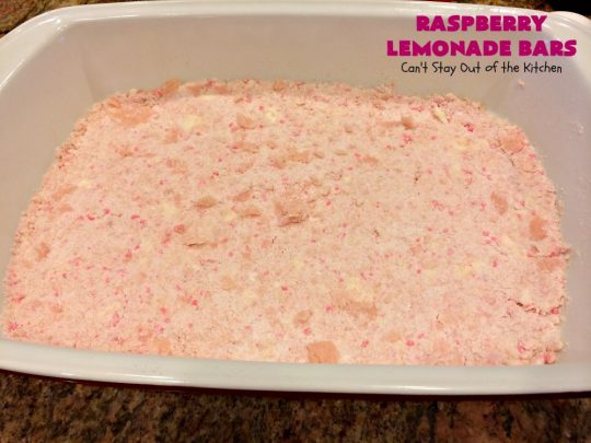 Raspberry Lemonade Bars | Can't Stay Out of the Kitchen | this heavenly 6-ingredient #recipe is perfect for #fall & #holiday #baking. It's especially good for #Christmas #cookie exchanges. It has a #raspberry preserves layer and a #cheesecake layer sandwiched between pink #lemonade cookie mix. So drool-worthy! #dessert #holidaydessert #Christmasdessert #raspberrydessert