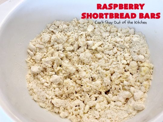 Raspberry Shortbread Bars | Can't Stay Out of the Kitchen | these #cookie type bars are absolutely divine! They have a shortbread crust, topped with #raspberry preserves & a #coconut topping. You'll be drooling over every bite! #dessert