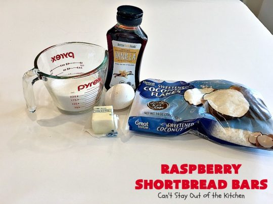 Raspberry Shortbread Bars | Can't Stay Out of the Kitchen | these #cookie type bars are absolutely divine! They have a shortbread crust, topped with #raspberry preserves & a #coconut topping. You'll be drooling over every bite! #dessert