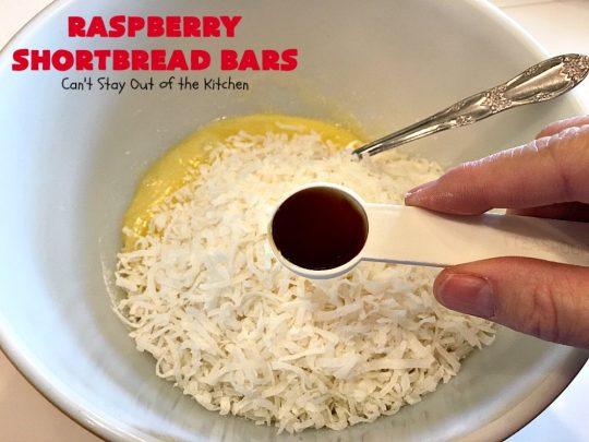Raspberry Shortbread Bars | Can't Stay Out of the Kitchen | these #cookie type bars are absolutely divine! They have a shortbread crust, topped with #raspberry preserves & a #coconut topping. You'll be drooling over every bite! #dessert