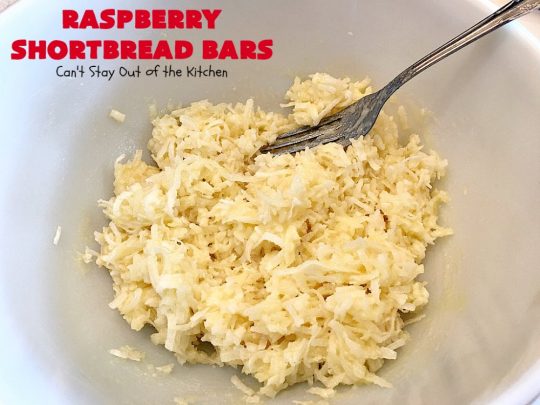 Raspberry Shortbread Bars | Can't Stay Out of the Kitchen | these #cookie type bars are absolutely divine! They have a shortbread crust, topped with #raspberry preserves & a #coconut topping. You'll be drooling over every bite! #dessert