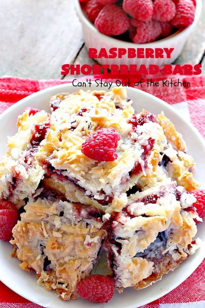 Raspberry Shortbread Bars | Can't Stay Out of the Kitchen | these #cookie type bars are absolutely divine! They have a shortbread crust, topped with #raspberry preserves & a #coconut topping. You'll be drooling over every bite! #dessert
