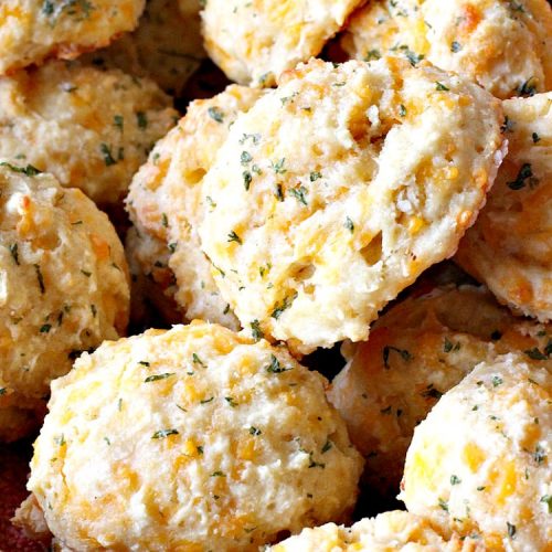 Red Lobster's Cheddar Bay Biscuits | Can't Stay Out of the Kitchen | these fantastic #biscuits are to die for! They are the BEST #copycat #recipe for #RedLobstersCheddarBayBiscuits. Terrific for family, company or #holiday dinners like #MothersDay or #FathersDay. #RedLobster #bread #CheddarBayBiscuits #BestCheddarBayBiscuitsRecipe #CheddarCheese