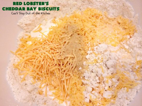Red Lobster's Cheddar Bay Biscuits | Can't Stay Out of the Kitchen | these fantastic #biscuits are to die for! They are the BEST #copycat #recipe for #RedLobstersCheddarBayBiscuits. Terrific for family, company or #holiday dinners like #MothersDay or #FathersDay. #RedLobster #bread #CheddarBayBiscuits #BestCheddarBayBiscuitsRecipe #CheddarCheese