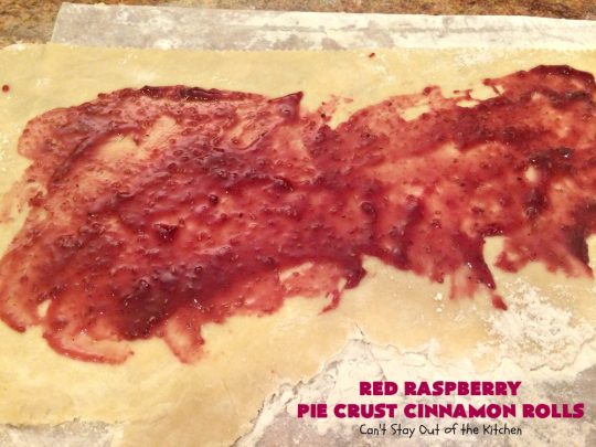 Red Raspberry Pie Crust Cinnamon Rolls | Can't Stay Out of the Kitchen | These #CinnamonRolls are awesome! My brothers and I would fight over them growing up. Homemade Pie Crust is filled with #RedRaspberryJam & sprinkled with cinnamon & sugar. These treats just dissolve in your mouth. Great for a #holiday #breakfast or for a snack any time--day or night! #Christmas #RedRaspberryPieCrustCinnamonRolls #brunch #HolidayBreakfast